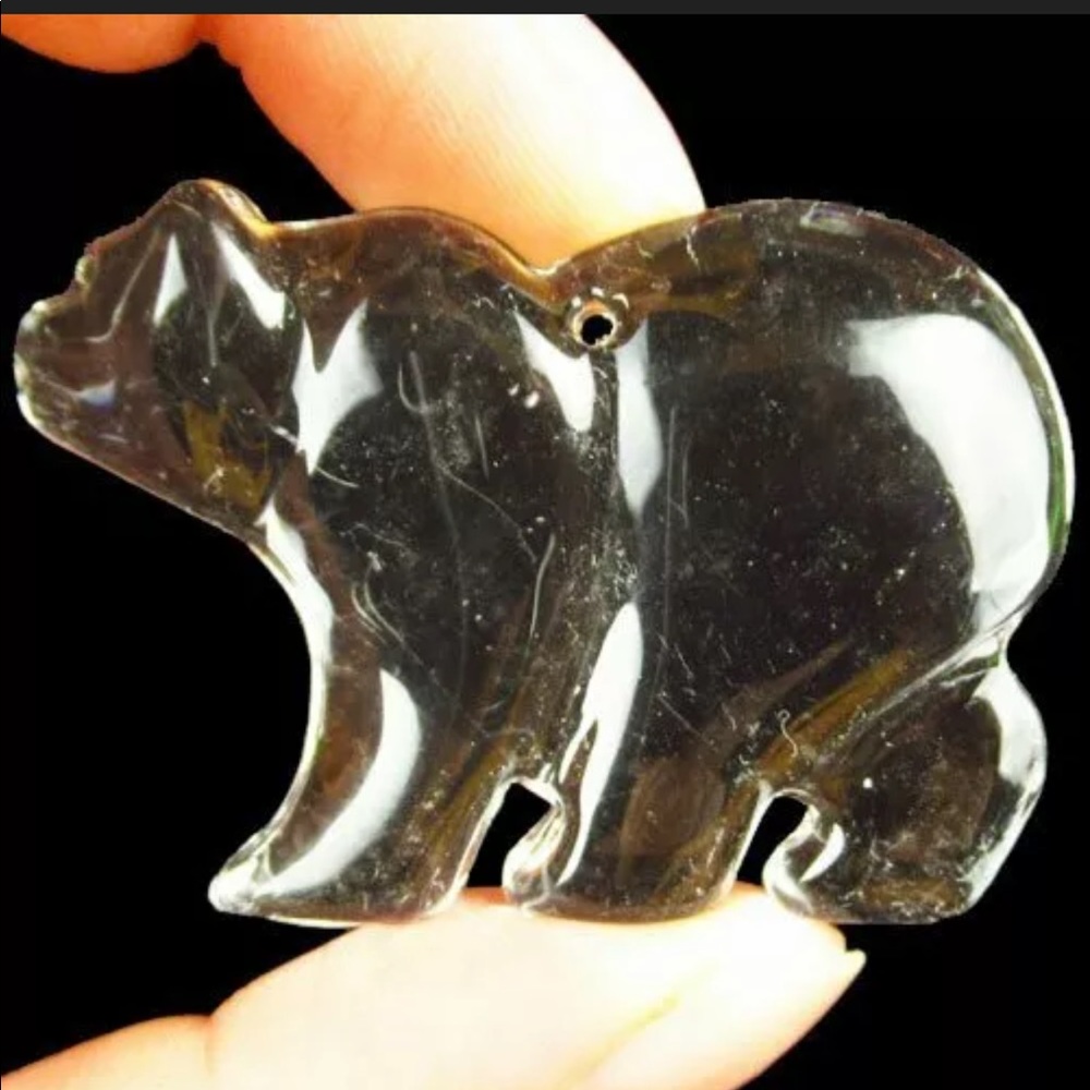 Carved white crystal bear pendant